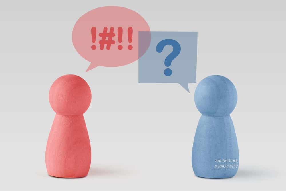 Abbildung: Eine rote und eine blaue Spielfigur. Konzept eines Gespräches.